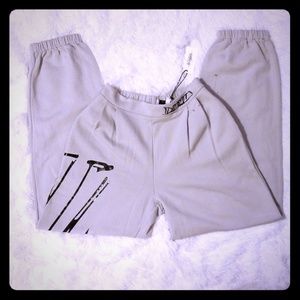 BRAND NEW pleated sweatpant by Daya by Zendaya. Ne